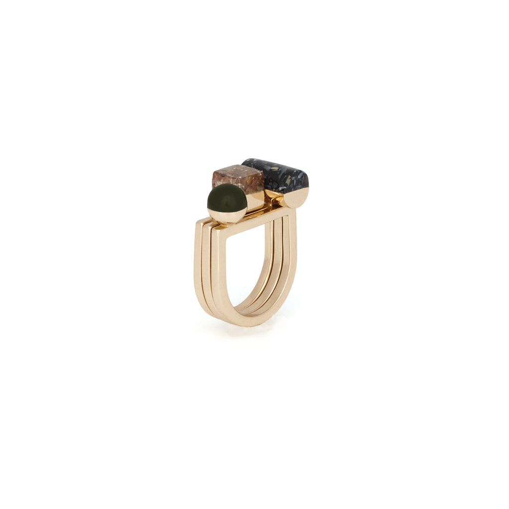 Polished brass stack rings with resin and shell.